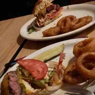 Perfect cheese burger with onion rings.
