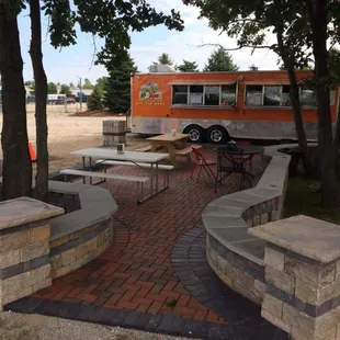 a food truck parked in the background