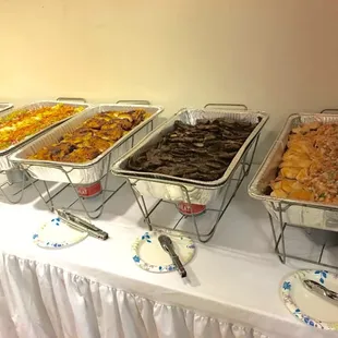 From l to r: yakisoba, roasted garlic chicken, kalbi and sautéed salmon with lomi relish