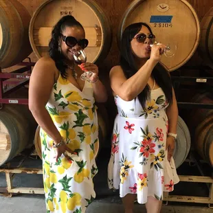 two women drinking wine