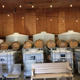barrels and tables in a cellar