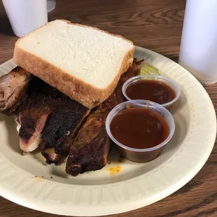 Rib sandwich is 4 ribs, bread, sauce, pickles, and onions(I requested none). Looks and smells fantastic!