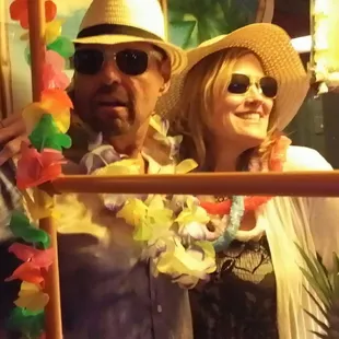 a man and woman posing for a picture