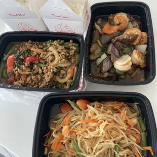 Spicy Basil with chicken, spicy egg Spicy Eggplant with shrimp, and papaya salad.