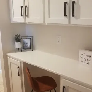 Altered this space from cabinets to a desk.