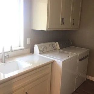 a washer and dryer in a kitchen