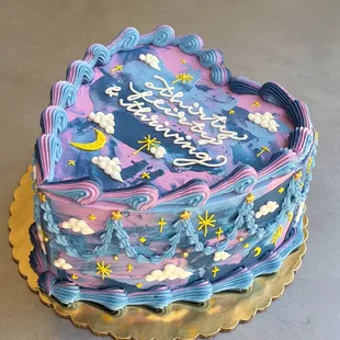 a blue and pink birthday cake