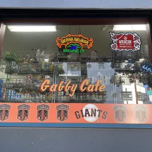 the front window of a coffee shop