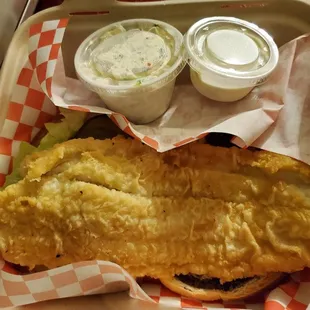 Fried fish sandwich, large and lightly battered. Good taste.