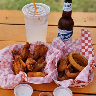 chicken wings, fries, and a drink