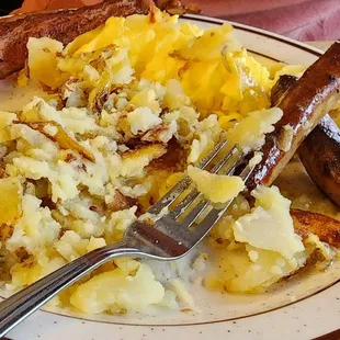 Scrambled eggs, bacon, sausage &amp; home fries...