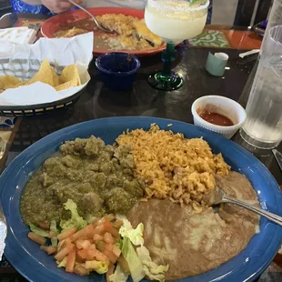 Chili Verde with a frozen Margarita in the background.