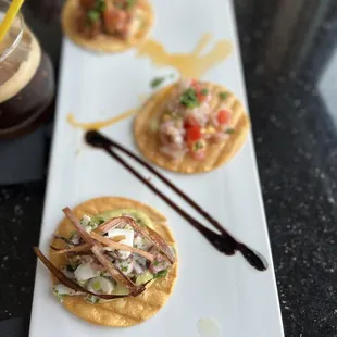 Ceviche with octopus in front .  I liked it the best