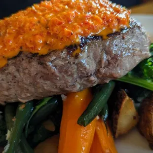 Steak of the Day with potatoes and market vegetables