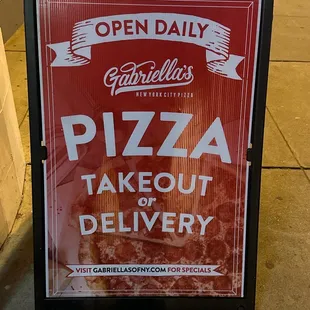 a sign for a takeout