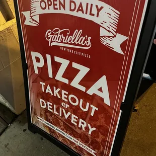a sign for a takeout delivery