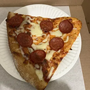 Slice of pepperoni pizza $6