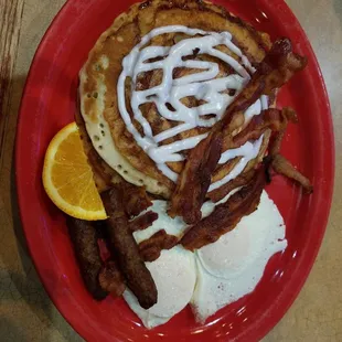 Flat cinnamon roll pancake, burned bacon