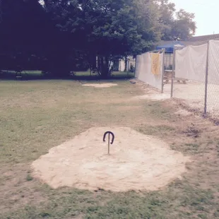 New horseshoe pit also out back behind the volleyball court