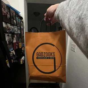 a person holding a bag