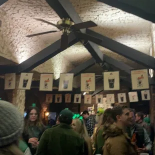 a crowd of people in a pub