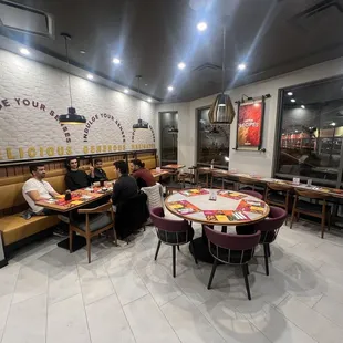 dude showing peace sign in back room (photo #18)