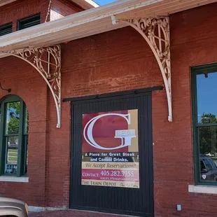 a truck parked in front of the building