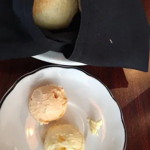 Butter, red pepper butter, and buns