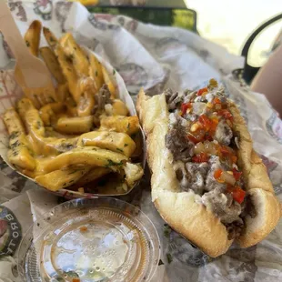 Original cheesesteak with added pepper relish and a side of cheese fries !