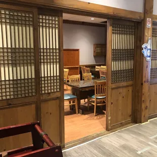The dining room set off by sliding ornate doors!