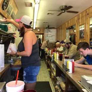 a woman serving customers