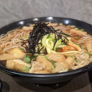 a bowl of food on a stove