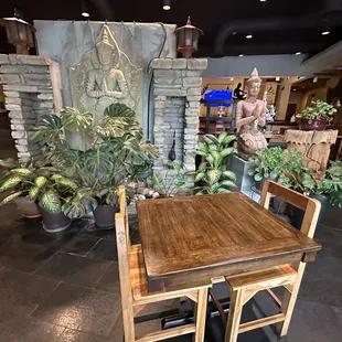 a table and chairs in a restaurant