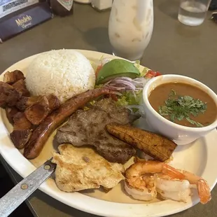 Galapagos Asado - a mix of shrimp and fried meats with a salad &amp; delicious beans and rice