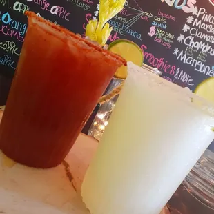 a close up of a glass of juice and a drink