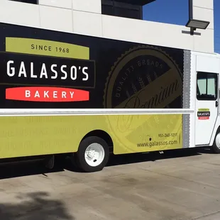 a food truck parked in front of a building