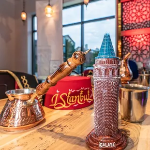 a wooden table with a tall tower on top of it