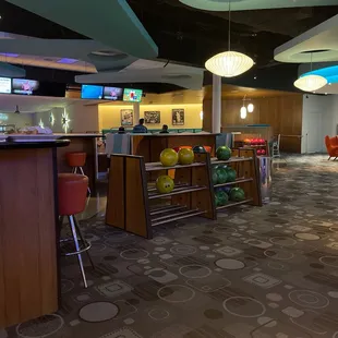 a bowling alley with bowling balls