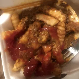 a fork in a container of food