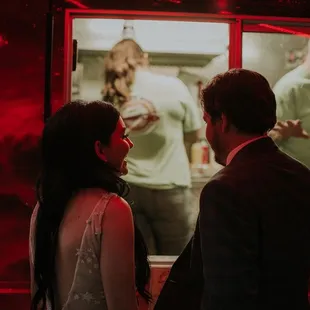 a man and a woman looking at each other