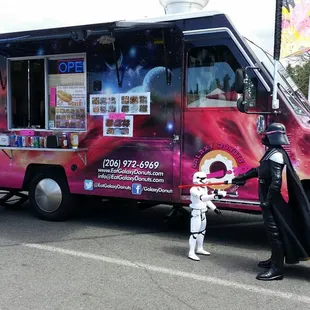 The truck plus stormtrooper and Darth