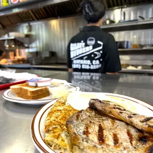 two plates of food on a counter