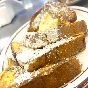 french toast with powdered sugar on top