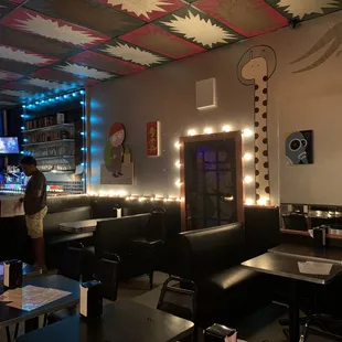 a woman standing in a restaurant