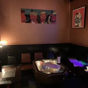 a hot tub in the middle of a dimly lit room