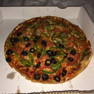 a whole pizza in a box