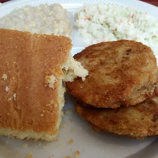 Salmon patties with corn, coleslaw and baked cornbread.