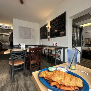 fish and chips on a blue plate