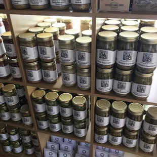 a shelf full of jars