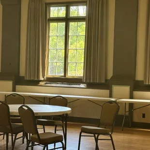 Inside chairs and tables provided by venue